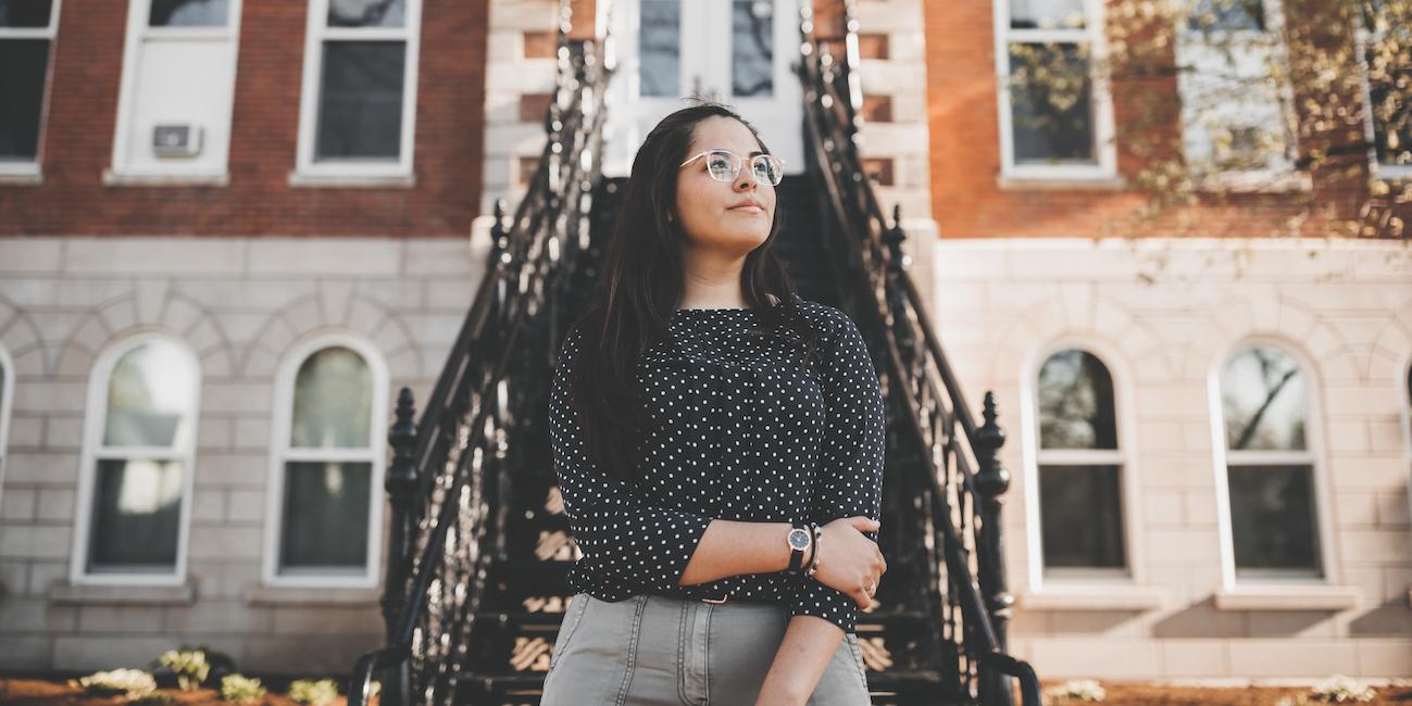 Perla in front of Ambrose Hall